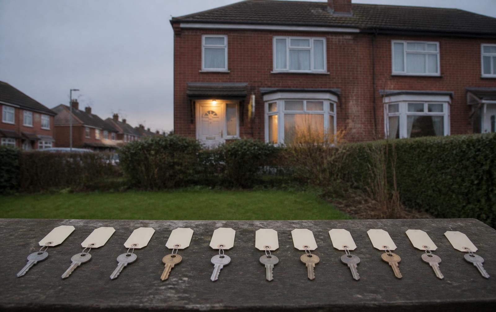 Editorial illustration of a modest Leeds family home represented with ten house keys.